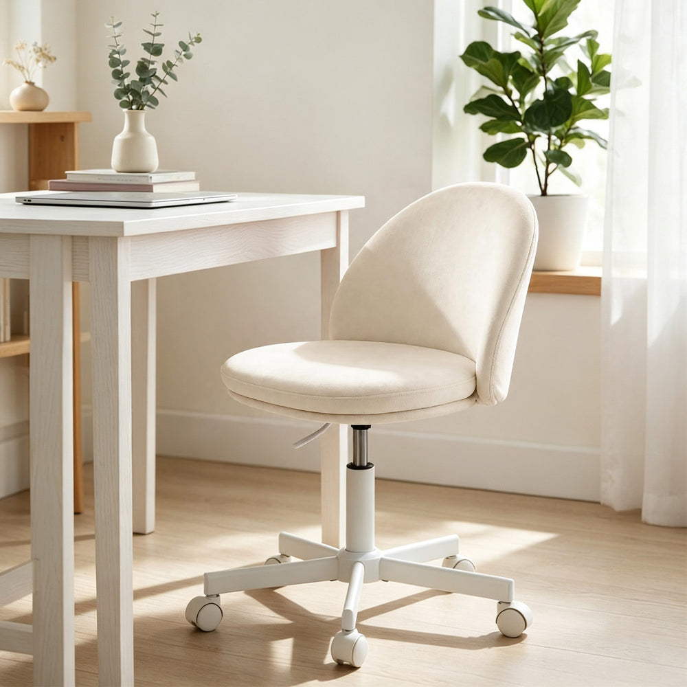 Ergonomic makeup chair with lumbar support, plush velvet cushion, and adjustable height for versatile use in any space.