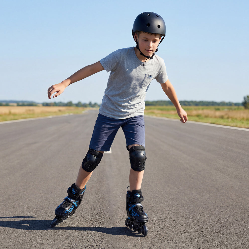 Boy skating in Adjustable Kids' Incline Skates with illuminating wheels on a sunny road, showcasing stability and.