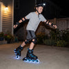 Adjustable kids' incline skates in blue with illuminating wheels, perfect for safe skating in low-light conditions.