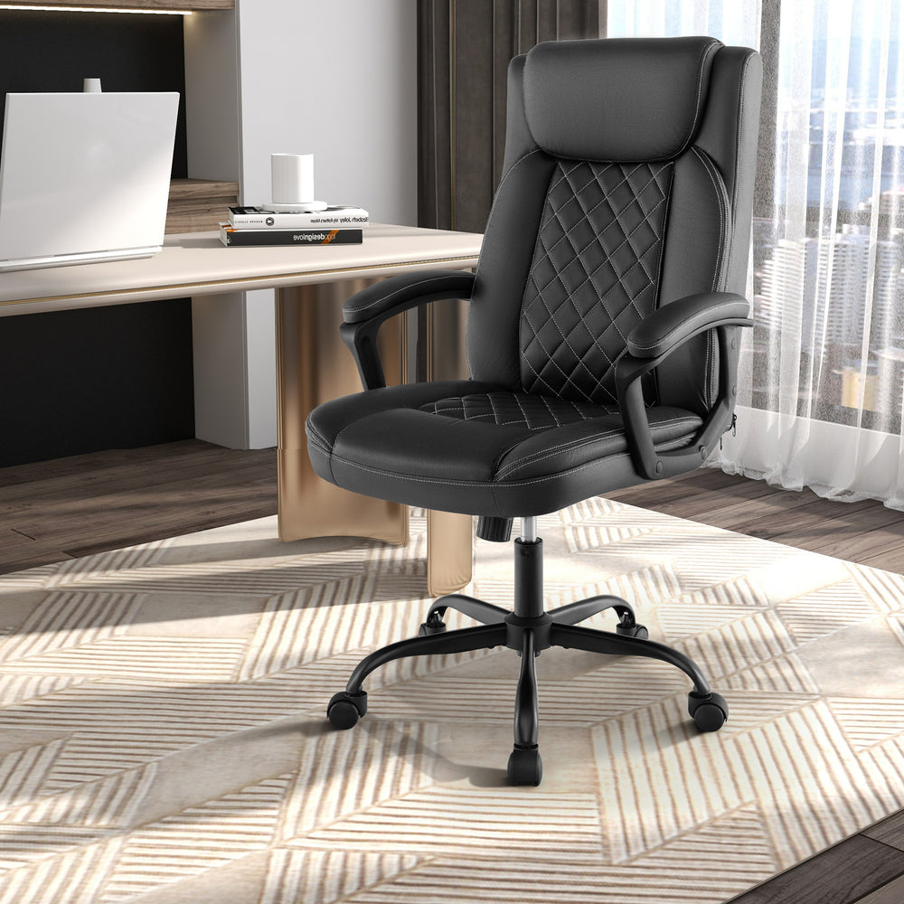High back ergonomic executive chair with smooth leathaire cover and double-stitched seams for durability and style.