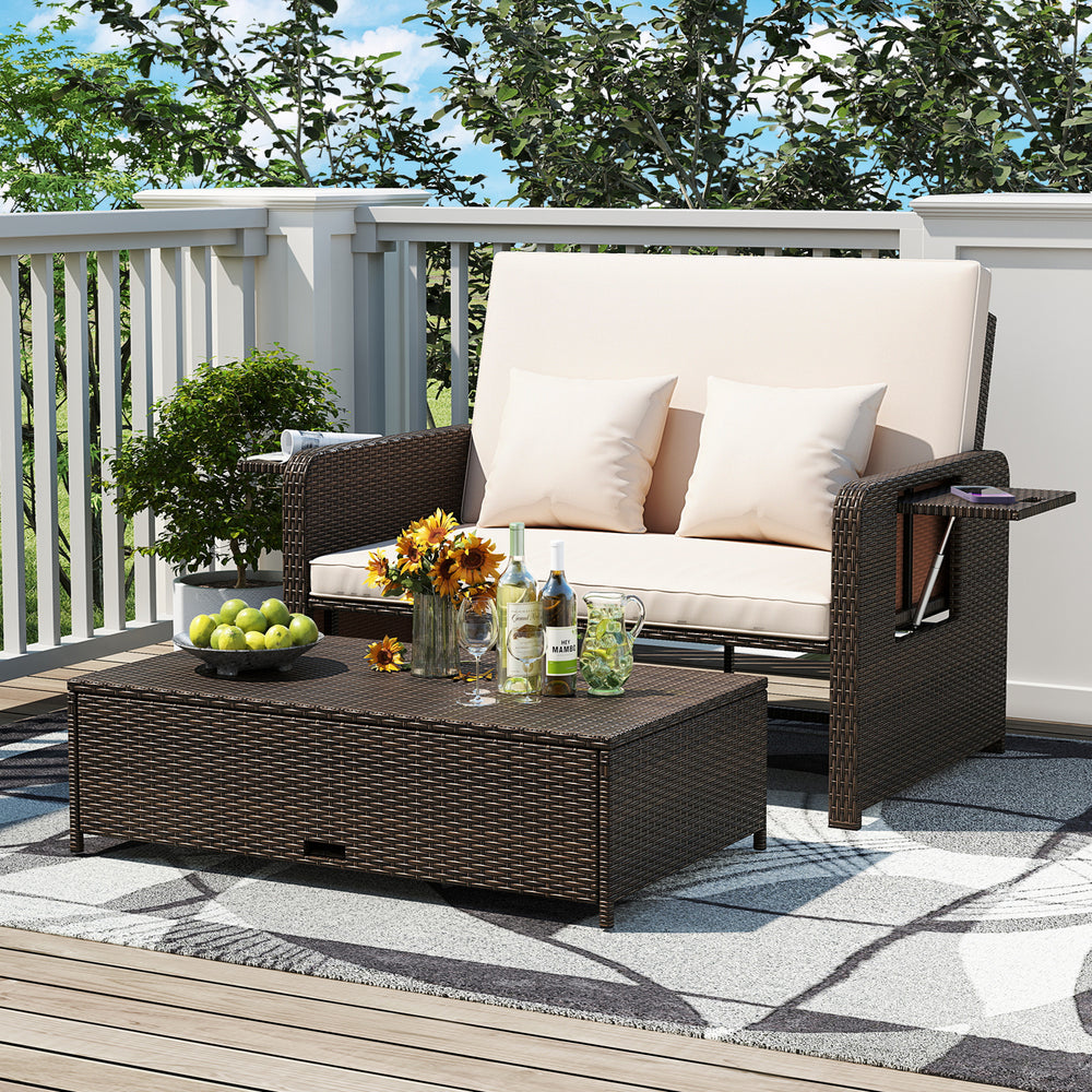 Loveseat with soft cushions and adjustable backrest, paired with a storage ottoman, ideal for outdoor patio relaxation.