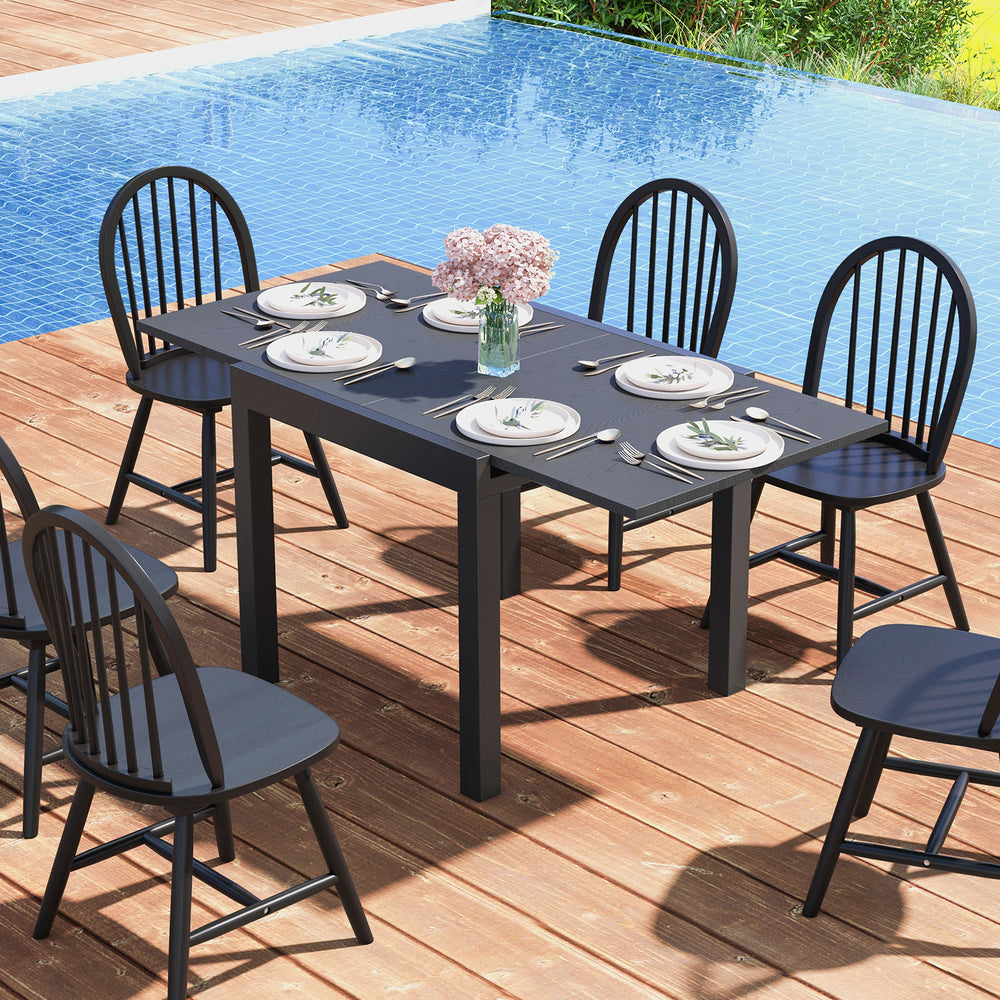 Adjustable 31.5"-63" gray patio dining table for 4-6 people, featuring a powder-coated aluminum frame, ideal for.