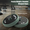 Close-up of 5.5 lb and 6 lb weight plates with anti-slip PVC edging, designed to prevent floor damage for home workouts.