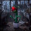 Animated Halloween man-eater plant prop with sharp teeth, glowing jaw, and posable leaves for a terrifying display.