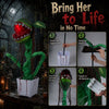 Animated Halloween man-eater plant prop with sharp teeth, glowing jaw, and posable leaves for spooky decor.