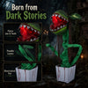 Animated Halloween man-eater plant prop with sharp teeth, glowing jaw, and posable leaves for customizable scares.