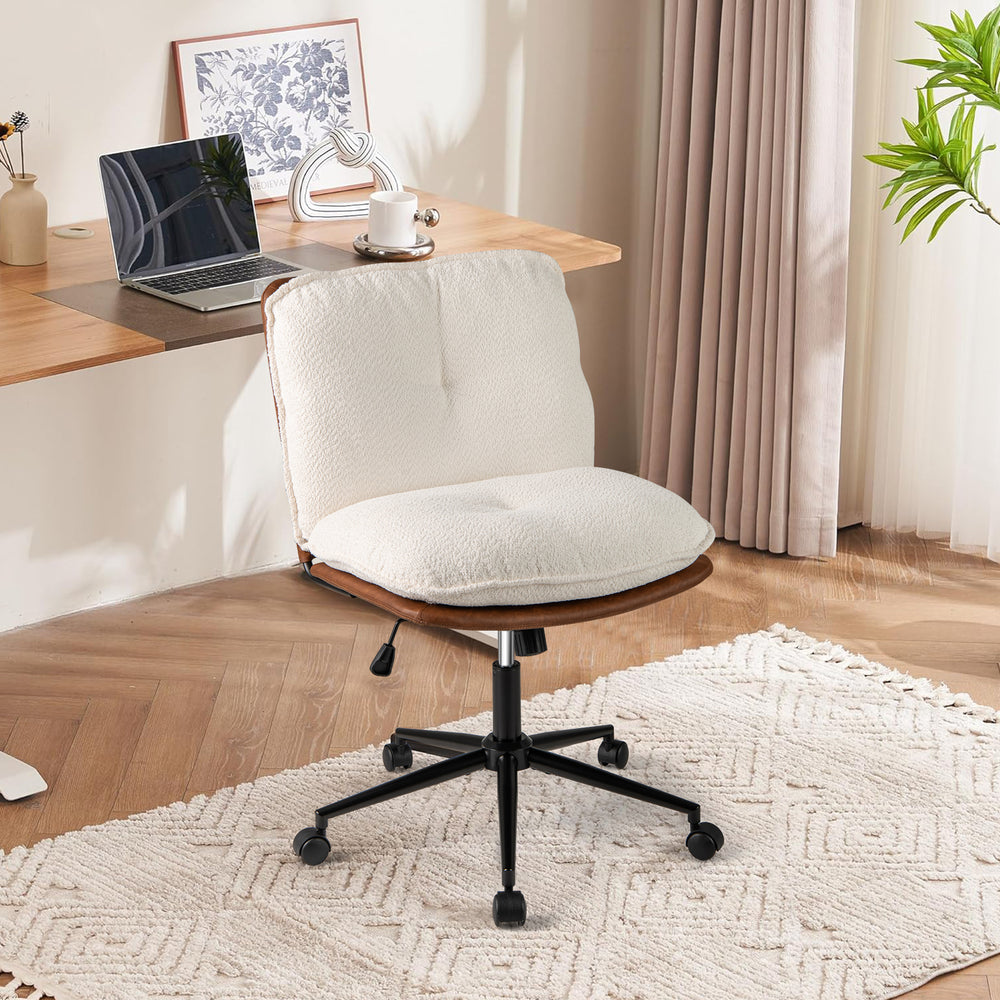 Armless home office chair with rocking backrest, adjustable height, and soft boucle cushion for comfortable seating.