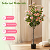 Artificial camellia tree with 27 blossoms in a cement pot, featuring lush green leaves for a natural look in any space.