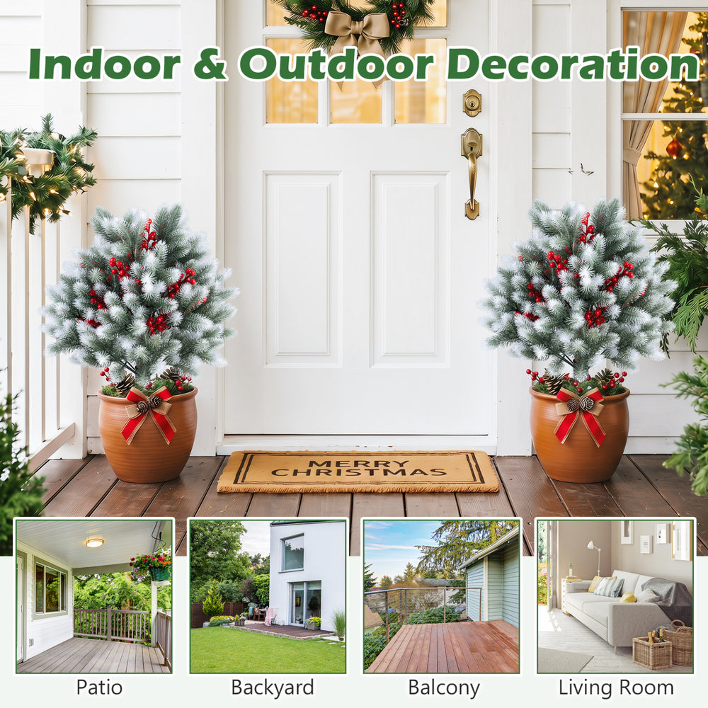 Artificial cedar topiary ball trees set of 2, 27.5" with red berries, perfect for winter decoration on patios or porches.