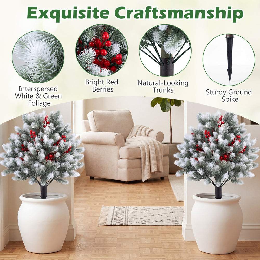 Artificial cedar topiary ball trees set of 2 with snowy foliage and red berries, perfect for winter patio decoration.