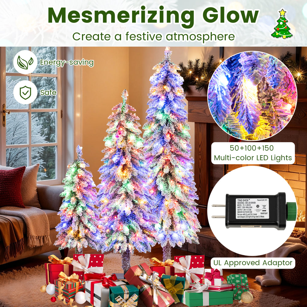 Artificial Christmas tree set of 3 with snow-flocked branches and multi-color LED lights for festive indoor decoration.