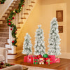 Three snow-flocked artificial Christmas trees with LED lights and presents, perfect for festive holiday decor.