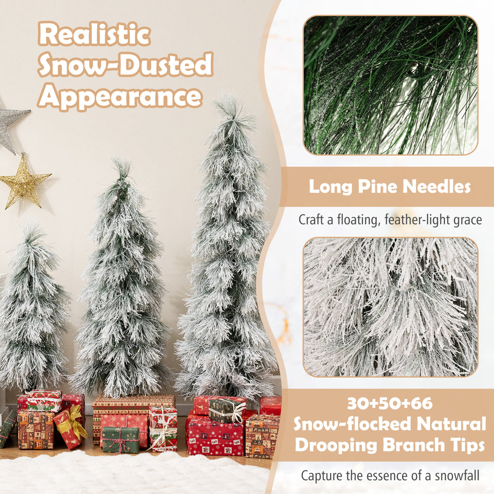 Set of 3 artificial Christmas trees with snow-flocked tips and warm white LED lights, perfect for holiday decor.