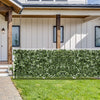 Artificial lily leaf privacy fence in a garden setting, made of durable polyester fabric for year-round vibrancy.