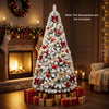 Snow-flocked 6 ft artificial Christmas tree with lush branch tips, perfect for indoor holiday decoration and gatherings.