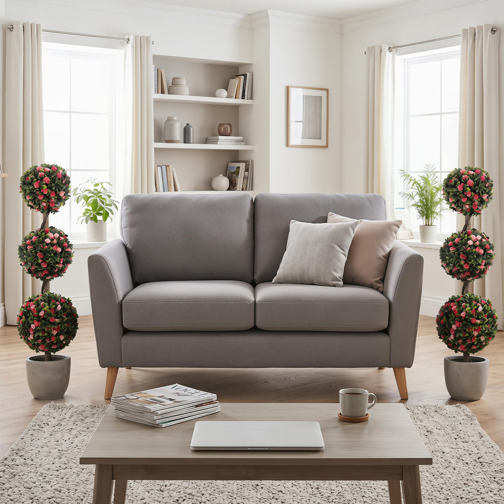 Triple-ball rose topiary tree in a cement-filled pot, featuring lifelike blooms for vibrant indoor or outdoor.