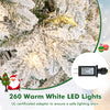 Flocked Christmas tree with 260 warm white LED lights, featuring a UL-certified adaptor for safe lighting.