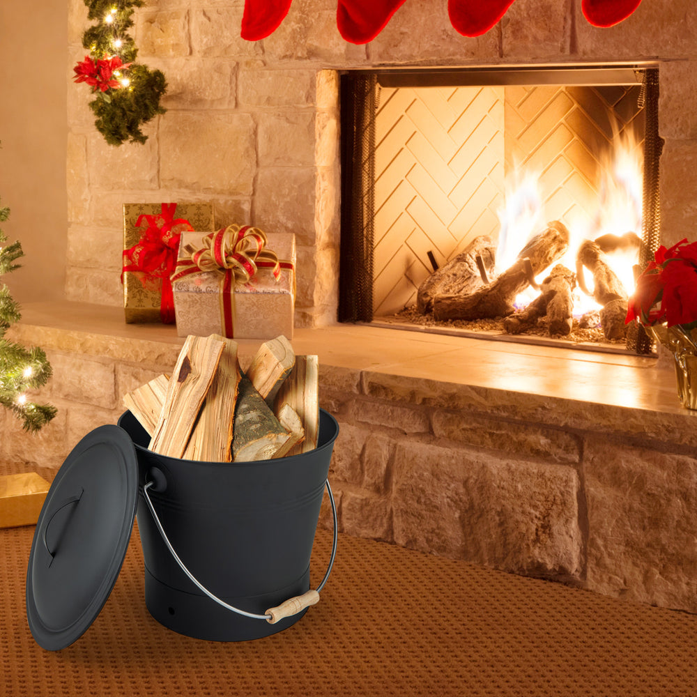 Black ash bucket with lid and cut-resistant gloves, perfect for transporting logs and ash by the fireplace.