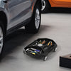 Automotive rolling tool creeper in black with 4 swivel casters and multiple compartments for efficient storage.