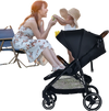 Black lightweight infant stroller with ergonomic backrest, detachable foot cover, and large storage basket for.