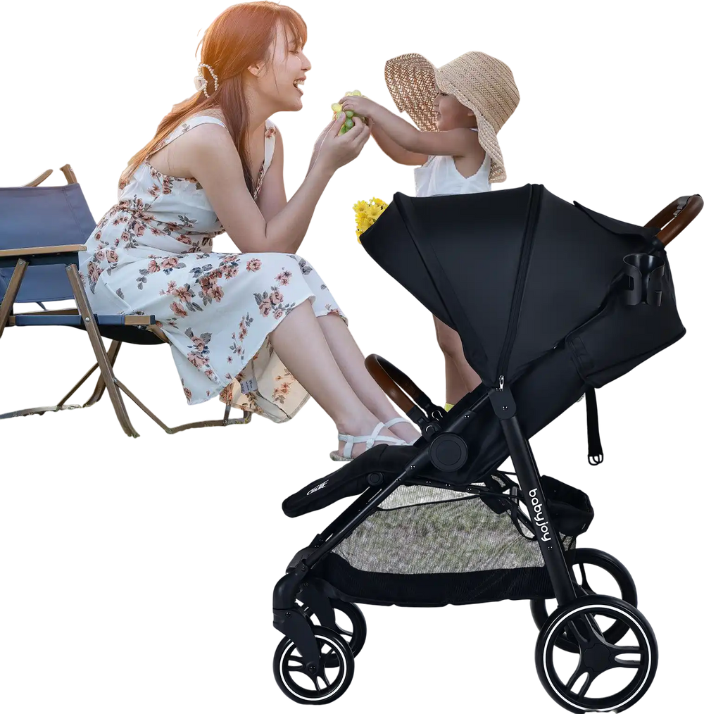 Black lightweight infant stroller with ergonomic backrest, detachable foot cover, and large storage basket for.
