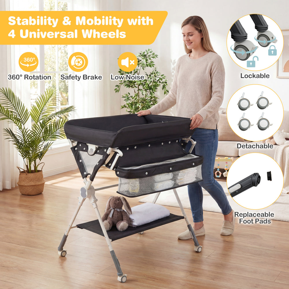 Foldable black baby changing table with storage bag, adjustable height, and 4 universal wheels for easy mobility.