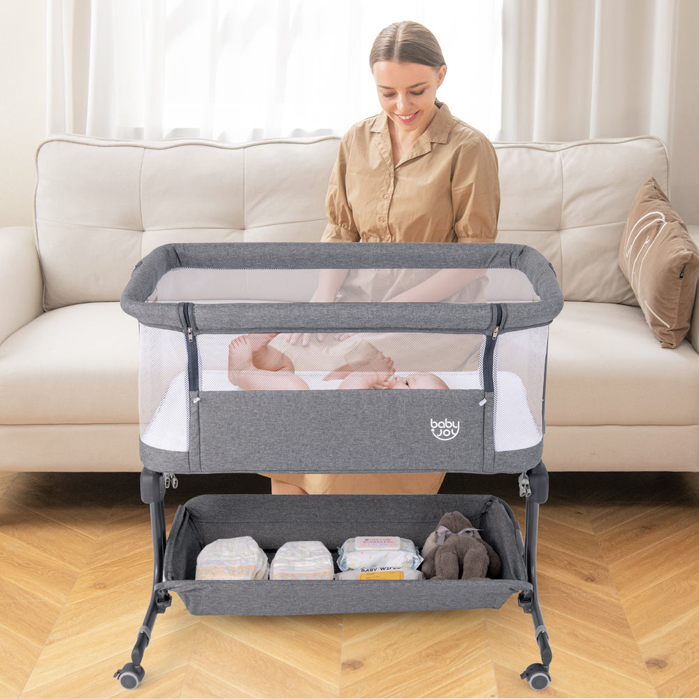 3-in-1 baby bassinet bedside sleeper in gray, showcasing the gentle incline angle feature for safe, peaceful sleep.
