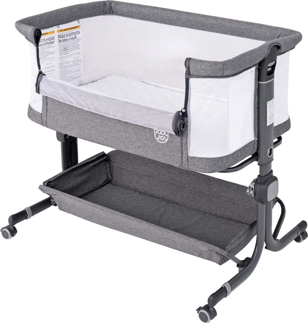Baby bassinet bedside sleeper in gray with adjustable height, storage rack, and portable design for convenient use.