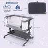 Baby bassinet bedside sleeper in gray with adjustable height, anti-reflux feature, and bottom storage for baby.