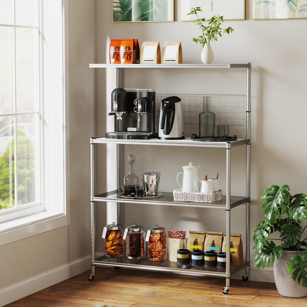 4-tier silver bakers rack on wheels with adjustable shelves, perfect for organizing kitchen utensils and appliances.