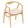 Bamboo accent chair with armrest and curved backrest, featuring a soft padded seat for comfort and rustic style.