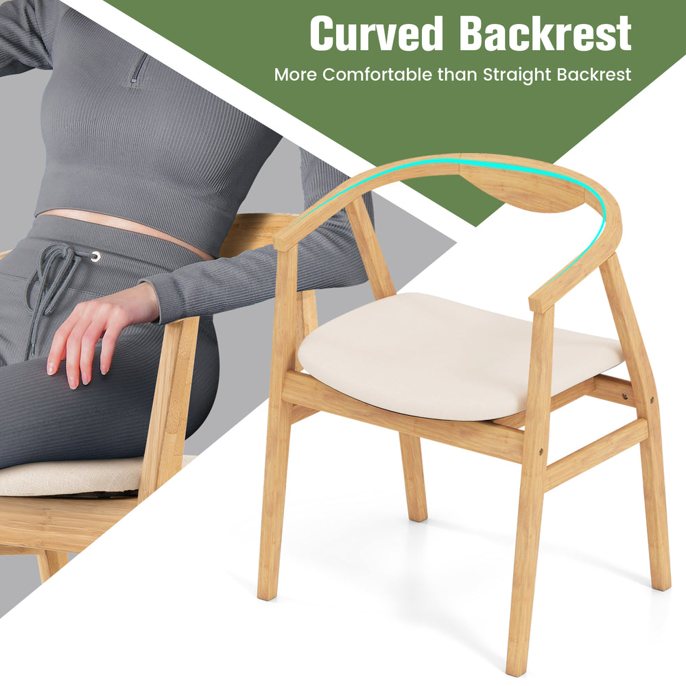 Bamboo accent chair with curved backrest and armrests, featuring a padded seat cushion for comfort and rustic style.