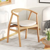 Bamboo accent chair with armrest and curved backrest, featuring a soft padded seat cushion for comfort in any room.