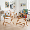 Bamboo art print rack features X-shaped support legs and a middle shelf for displaying canvases and artwork up to 34" x 19".