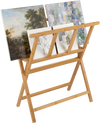 Bamboo art print rack with X-shaped support holds canvases up to 34" x 19" for organized display in art studios or galleries.