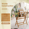 Bamboo art print rack features sturdy X-shaped support legs and a middle shelf for displaying canvases and photos.