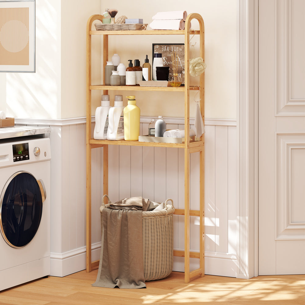 3-tier bamboo bathroom organizer with adjustable shelves, hooks, and slatted design for efficient storage and drying.