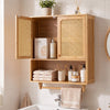 Bamboo bathroom wall cabinet with ventilated doors, towel rack, and multi-layer storage for organized essentials.