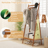 Bamboo clothes rack with hanging rod, rattan shelf, and copper hooks, featuring a sturdy triangle structure for.
