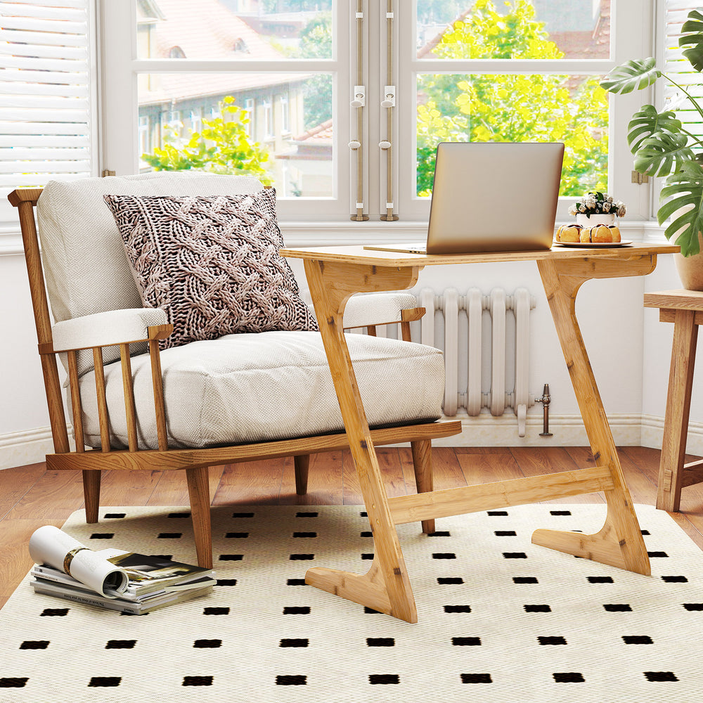 Bamboo Z-shaped side table with spacious tabletop, ideal for small spaces, supporting up to 110 lbs for versatile use.