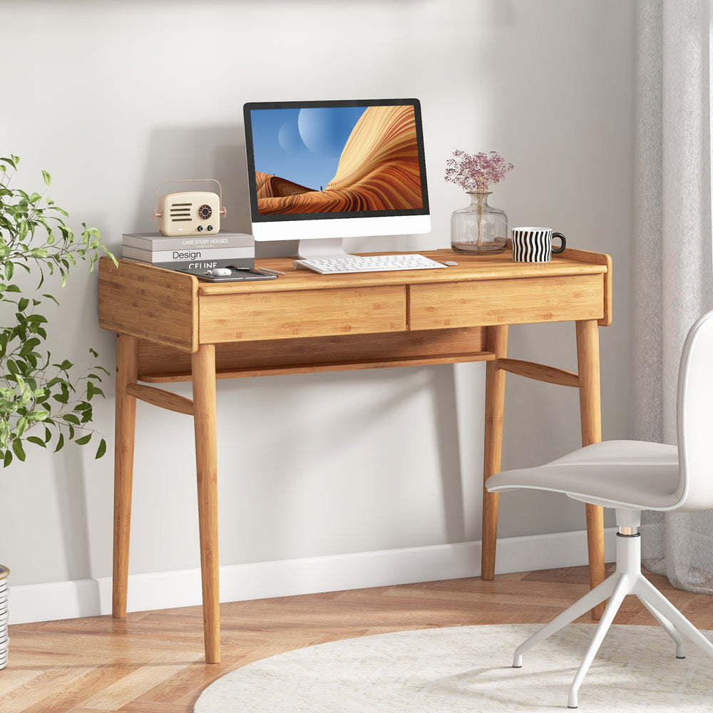 Bamboo writing desk with two storage drawers and open shelf, ideal for studying or working in a stylish setting.