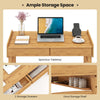 Bamboo writing desk with spacious tabletop, two storage drawers, and open shelf for organized workspace.