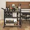 3-tier brown bar cart on wheels with wine rack, glass holder, and ample storage for kitchen or serving needs.
