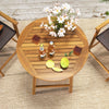 Round slatted tabletop of the acacia wood bar height table with umbrella hole, ideal for outdoor patios and decks.