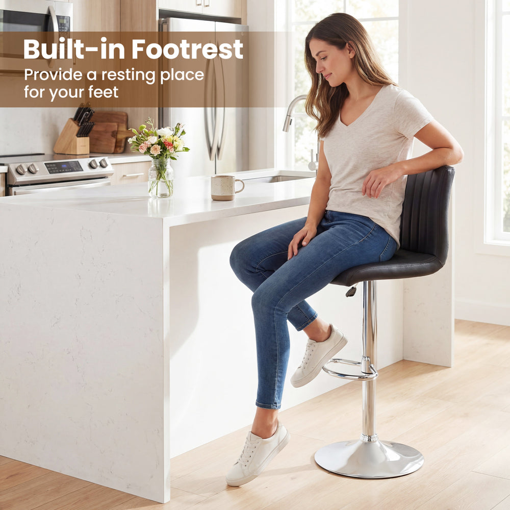Adjustable swivel bar stool with backrest and built-in footrest, featuring black faux leather and chrome base for.