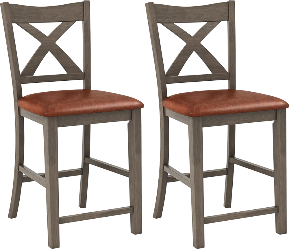 Set of 2 gray bar stools with cross back design and faux leather upholstered seats for stylish comfort.