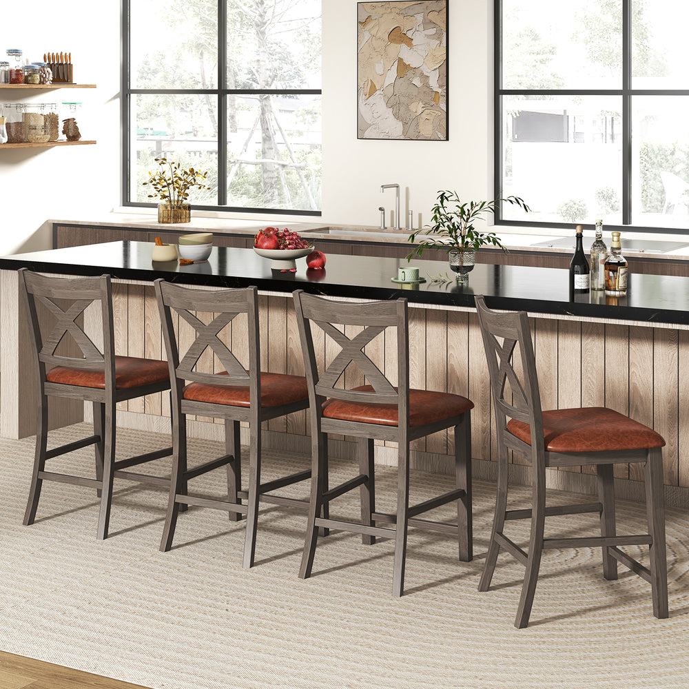 Set of two gray bar stools with cross back and faux leather upholstered seats, perfect for kitchen or dining areas.