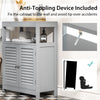 Freestanding gray bathroom cabinet with double shutter doors, adjustable shelf, and anti-tipping device for safety.