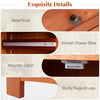 Close-up of the metal knob and smooth drawer slide on a brown bathroom storage cabinet with a glass door.