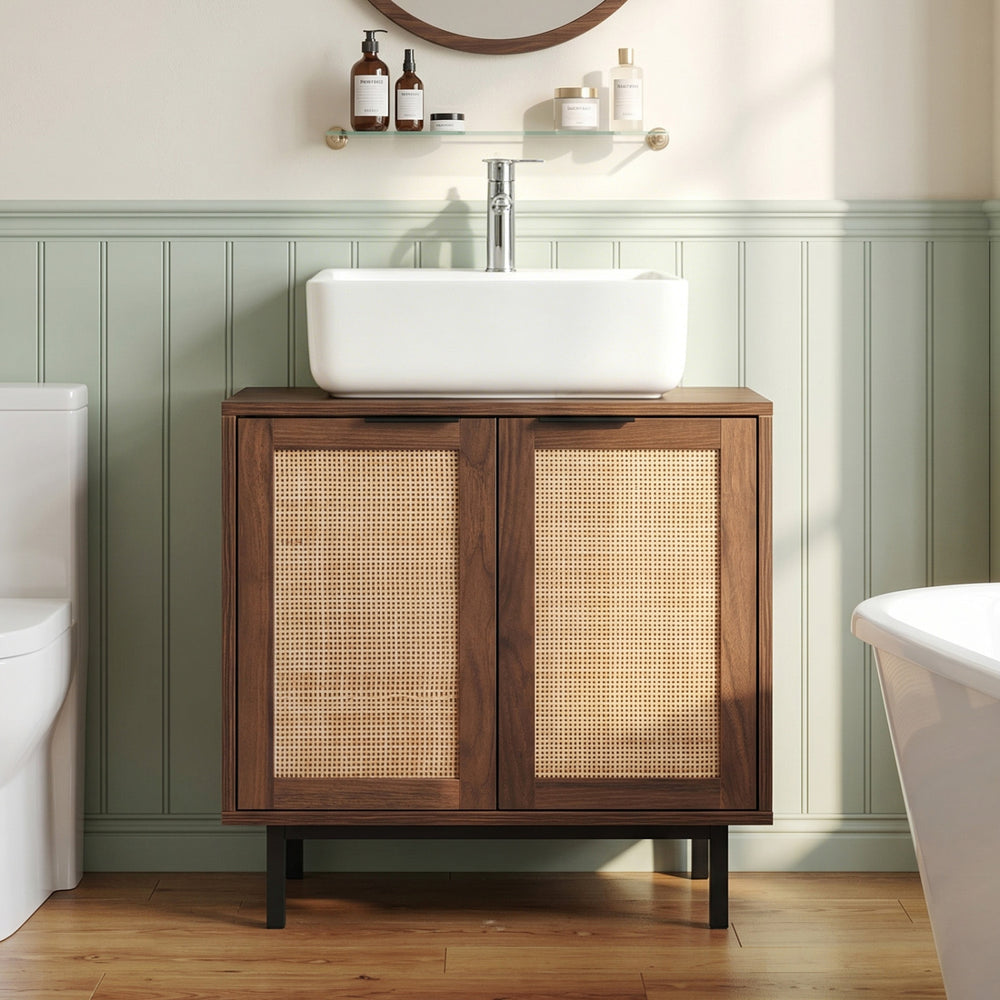 Freestanding bathroom vanity cabinet with U-shaped cut-out, featuring two rattan doors and metal legs for stylish.
